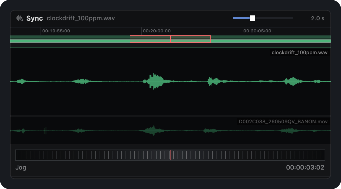 The Sync scope of the CLIP tab: the selected audio waveform stacked over the camera clip it was synced against, with a ridged jog wheel and a position readout beneath